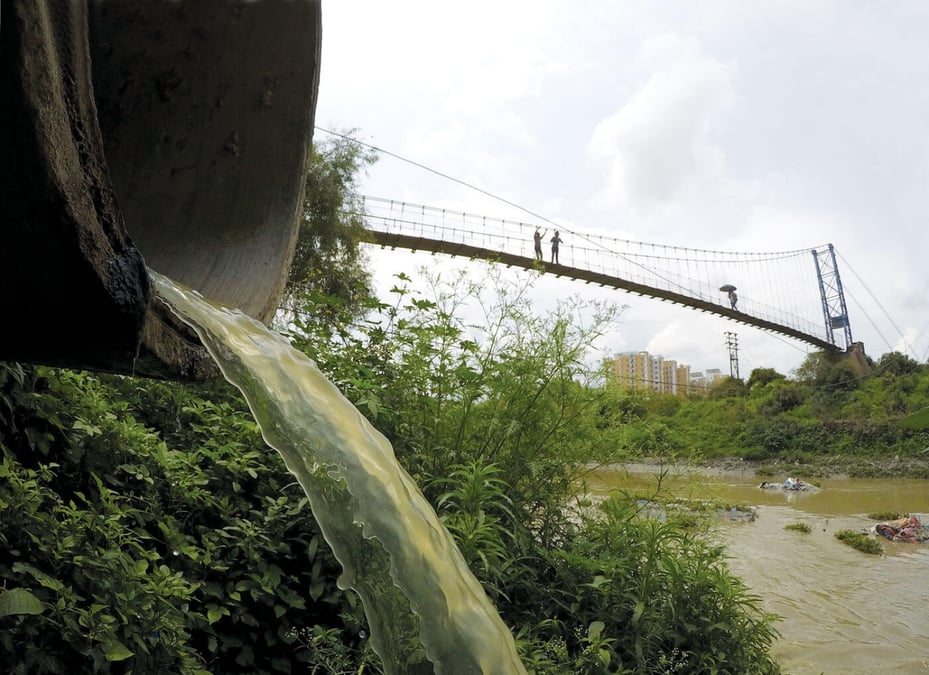 Raw sewage emptying in to the holy banks of the Bagmati at Sankhamul in Patan.